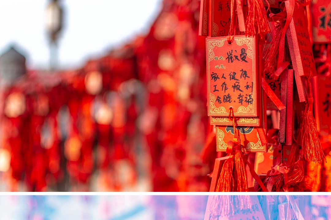 Red Buddhist prayer tablets