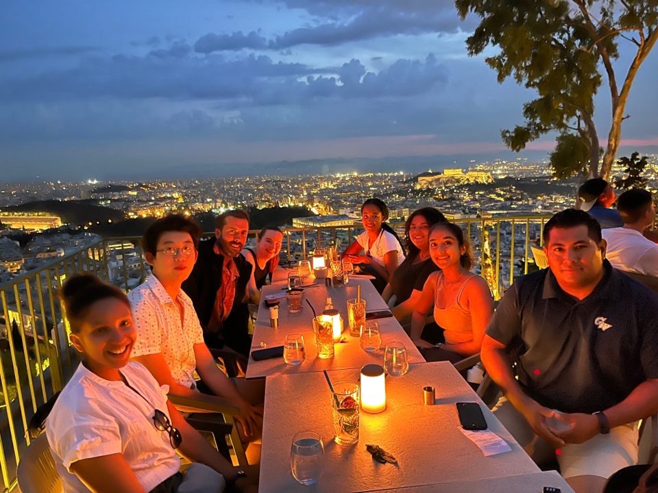 Students at dinner in Greece