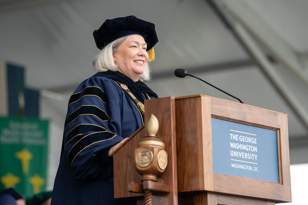 President Ellen Granberg speaking at a podium during the 2024 GW Commencement