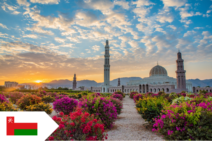 sunrise over a Mosque. Omani flag in corner