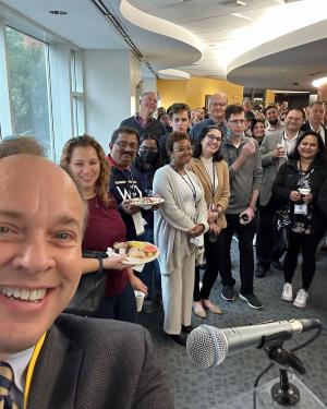 Dean Paul Wahlbeck with CCAS parents and students enjoying Alumni and Families Weekend.