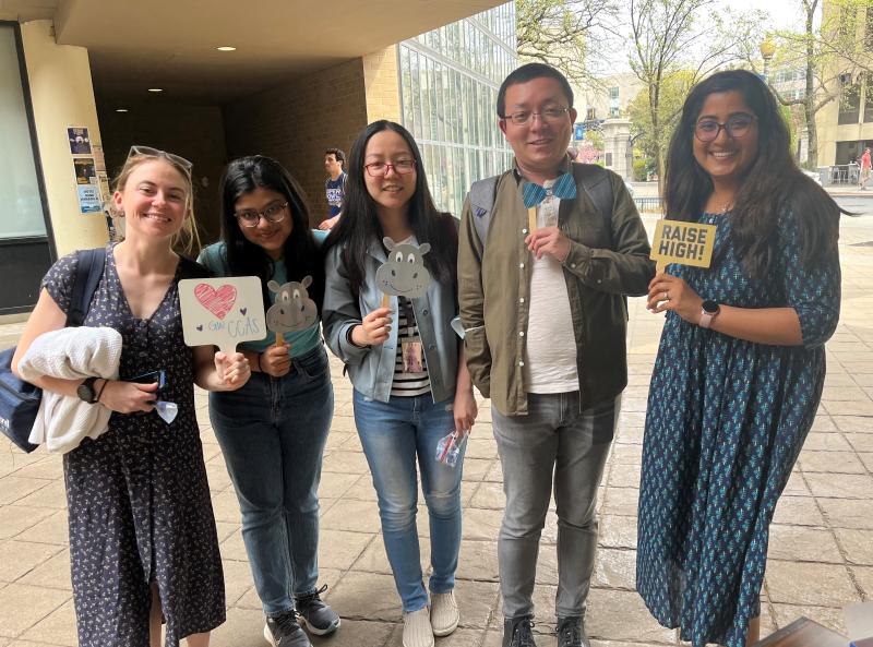 Five students pose at a GSAW event