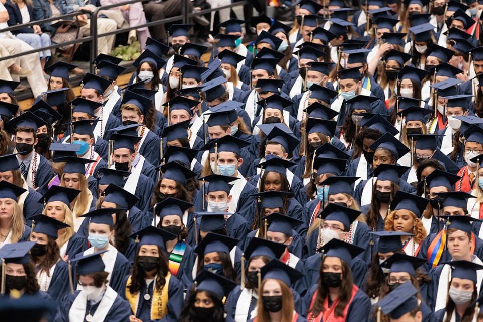 A sea of students in caps and gowns