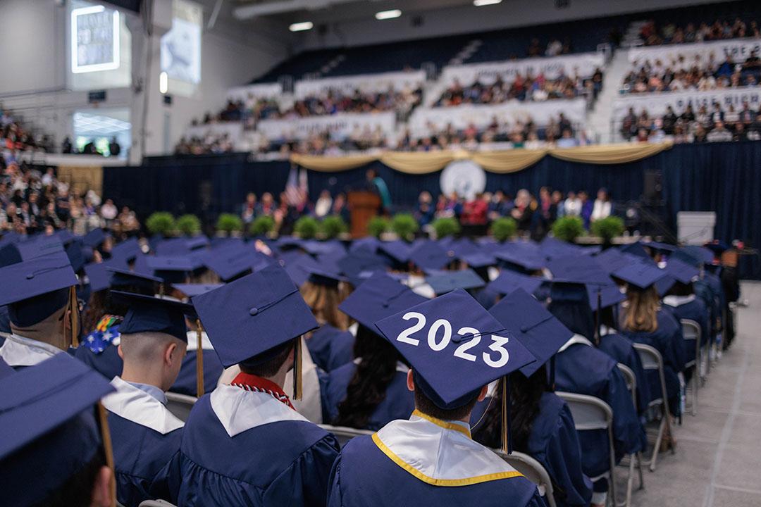 Grad caps at the CCAS undergraduate ceremony, with one reading "2023"