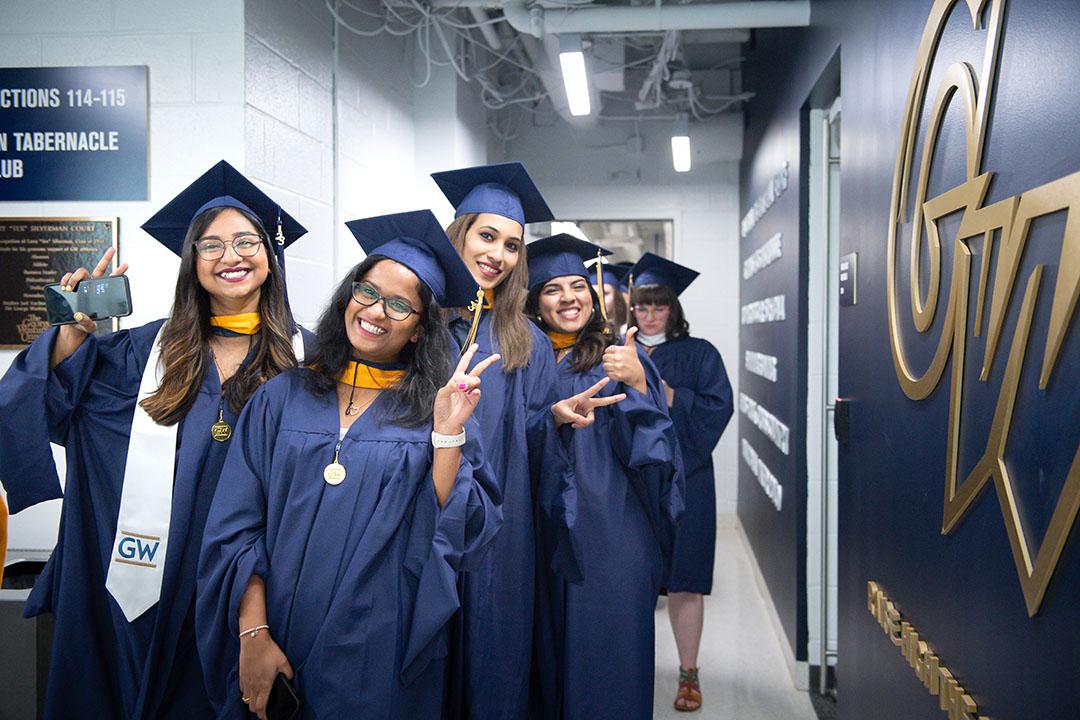 A group of CCAS master's students smiling for the camera