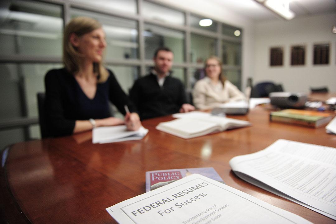 TSPPPA group seated at a table with career resources