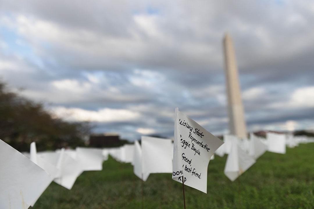 National Monument with white flags