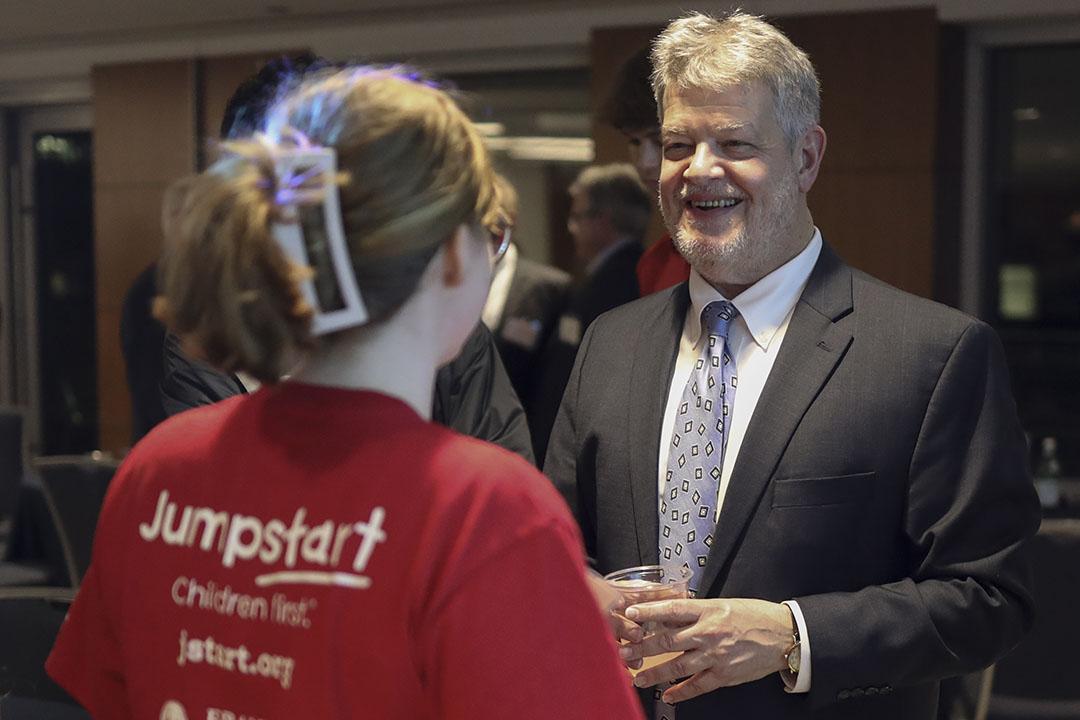 Student and faculty member talking