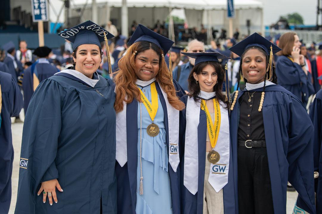 Recent graduates in caps, gowns and tassels at the 2024 GW Commencement on the National Mall