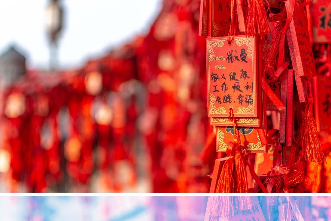 Red Buddhist prayer tablets