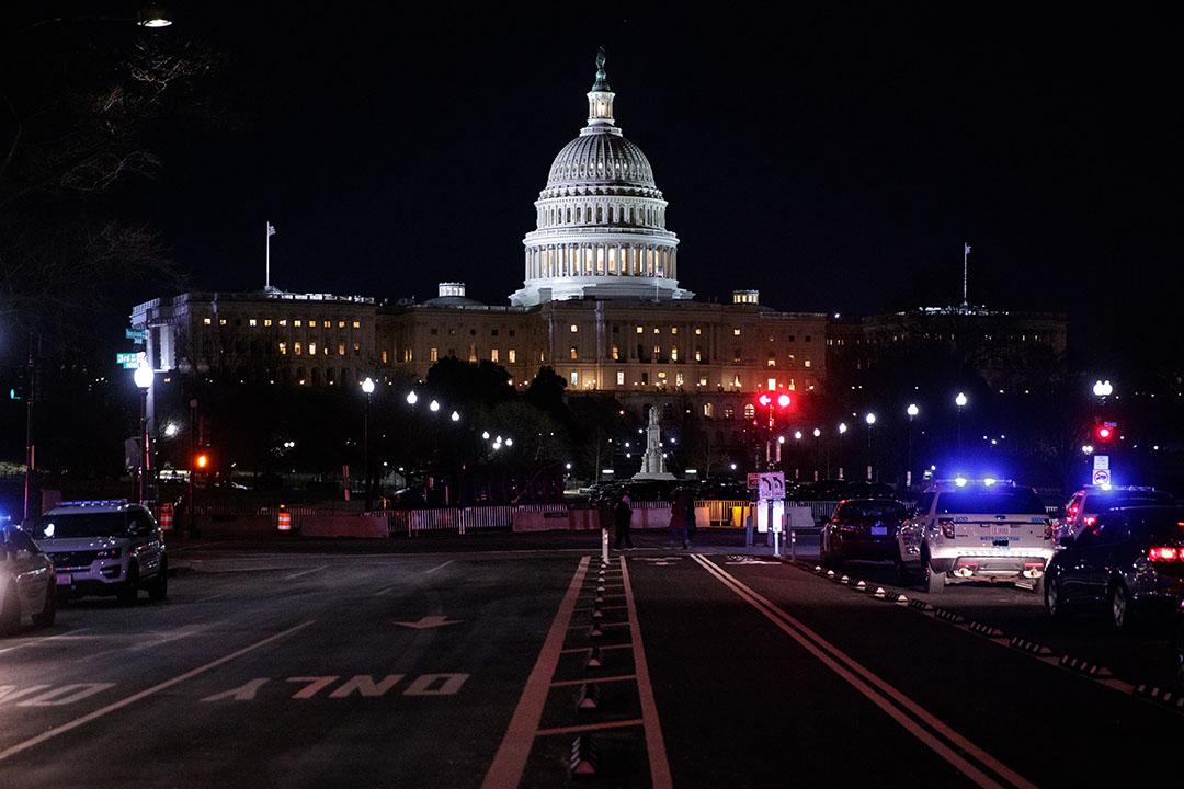 DC Capitol building at night lit up 