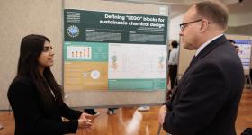 Biology and statistics major Chaitrali Patil discussed her project on designing safer pesticides with CCAS Dean Paul Wahlbeck at the CCAS Research Showcase. (Photos: William Atkins/GW Today)